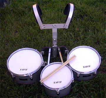 BRAND NEW MARCHING TRI TOM DRUMS W/WARRANTY.  