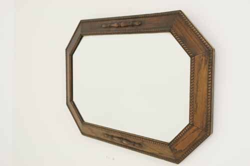 Solid oak bevelled mirror in dark oak finish.  Beading is all intact 