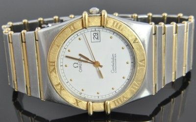 Solid 18K yellow gold bezel with beautifully engraved Roman numerals