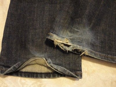 Authentic Nomad Tribe Low Rise Straight Slim Leg Jeans in a Dark Wash 