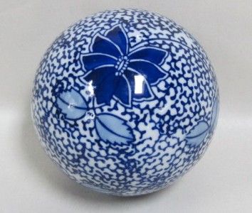 Four Decorative Blue and White Ceramic Balls  