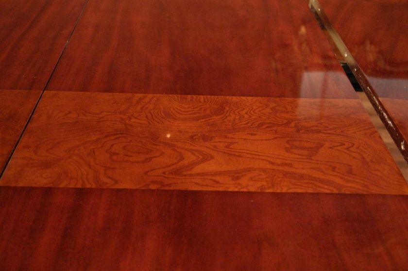 54 Round to Oval Mahogany Dining Table with Leaves  